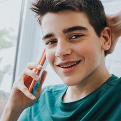 teenager smiling with braces