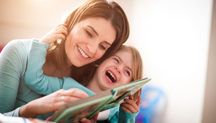 Mother and child reading a book