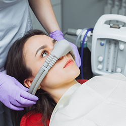 A woman getting sedation dentistry in Flower Mound