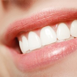 Close-up of person’s mouth while they’re smiling